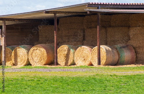 Straw and Hay Bales Stored in a Farm Shelter