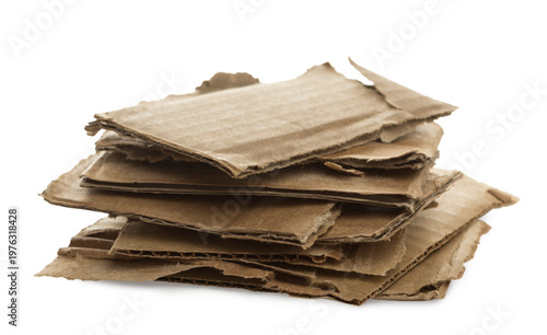 Stack of torn corrugated cardboard pieces with rough edges, brown recycled packaging material isolated on transparent background, close up