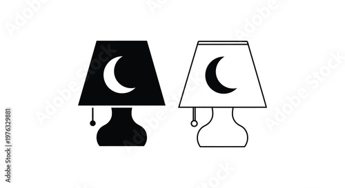 Two table lamps with crescent moon designs a black and a white silhouette
