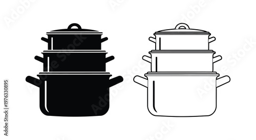 Foto Two stacks of cooking pots one dark and one light in silhouette