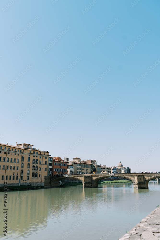 Fototapeta premium Tranquil Waterfront Scenery Reflecting Colorful Building Facades