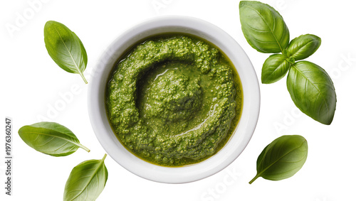 Obraz na płótnie Fresh green pesto in white bowl with basil leaves, isolated on transparent backg