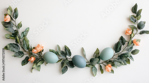 A delicate floral arrangement with pastel eggs and peach blossoms creates an elegant and cheerful Easter or sptime decoration on a bright white background.