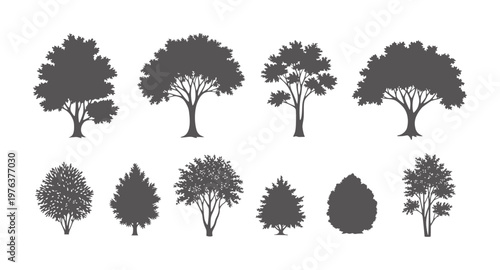 Collection of eight dark gray tree silhouettes with varied foliage and trunk shapes