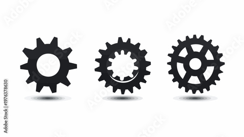 Three stylized black gear icons with varying designs, each casting a subtle shadow on a white background