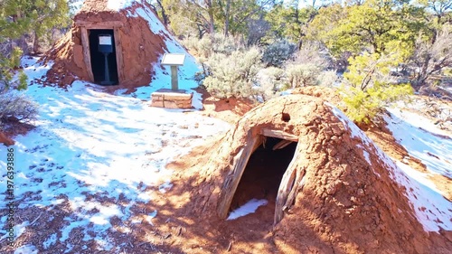 Traditional Navajo hogan dwelling is displayed within cultural landscape at Navajo National Monument in Arizona