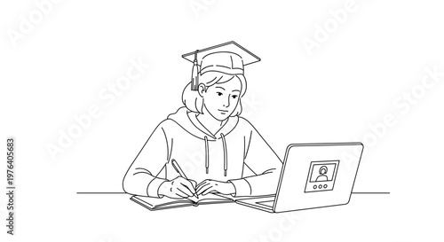 A young female graduate wearing a cap and gown is diligently studying at a desk with a laptop and open book, engrossed in her academic pursuits.