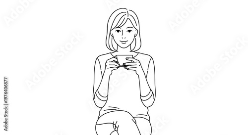 A calm young woman sitting comfortably and holding a warm mug with both hands, enjoying a quiet moment of relaxation.