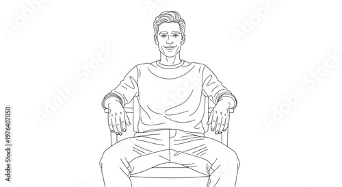A casually dressed man is confidently seated in a comfortable chair, looking directly at the viewer with a pleasant expression.