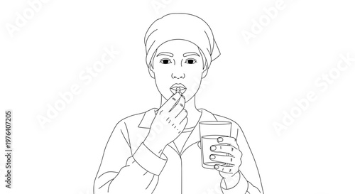 A responsible woman carefully takes a pill with a glass of water, focusing on her health and medication routine.