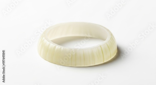 A single ring of fresh sliced white onion on a plain white background for cooking and recipe use