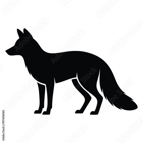 A striking black silhouette of a fox standing in profile showcasing its elegant form silhouette
