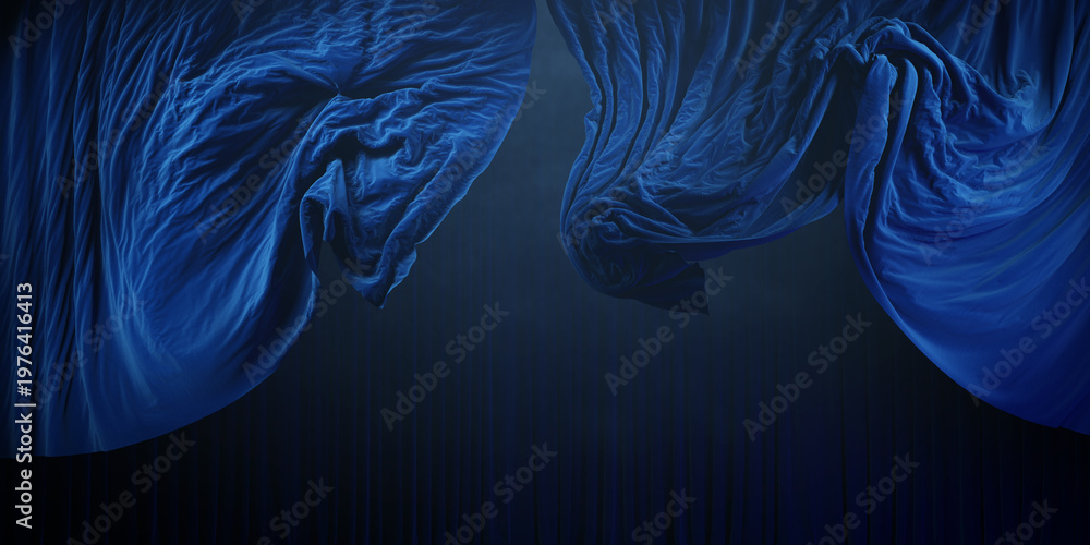 Fototapeta premium Dramatic blue silk fabric flowing in mid air on theater stage. Dark scene with smoke. 