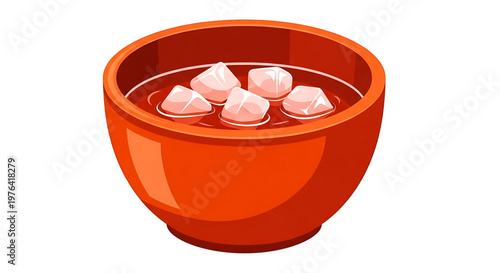 A vibrant orange bowl filled with pink ice cubes in a refreshing drink