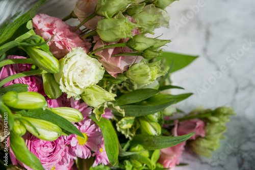 Celebrate special occasions with a colorful summer bouquet featuring fresh roses, eustoma blooms, creating an elegant and fragrant floral arrangement. love concept. copy space
