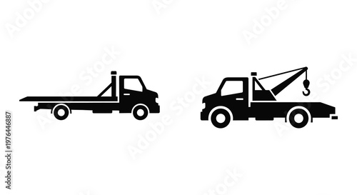 Two black tow trucks depicted in a minimalist silhouette