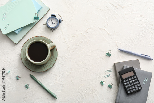 Cup of coffee, notebooks, c...