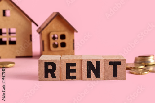 Word RENT, money and wooden...
