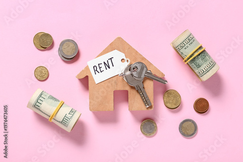 Wooden house, keys, money a...