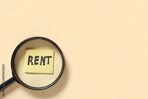 Word RENT under magnifying ...