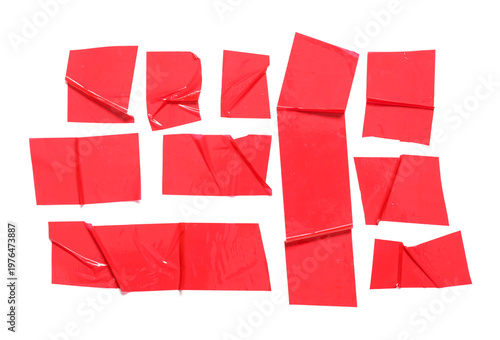 Crumpled strips of red adhe...