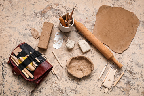 Clay plate and sculptor too...