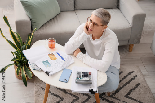 Mature woman in debt near t...