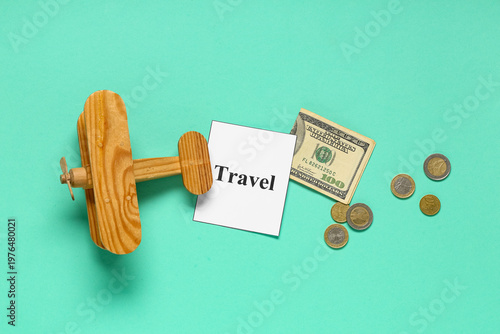 Paper with word TRAVEL, woo...