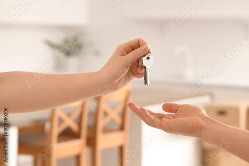 Realtor giving keys from fl...