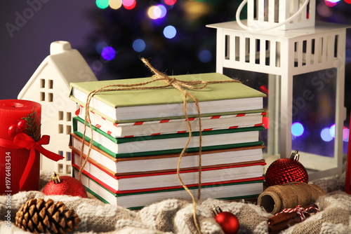 Books with Christmas decor,...