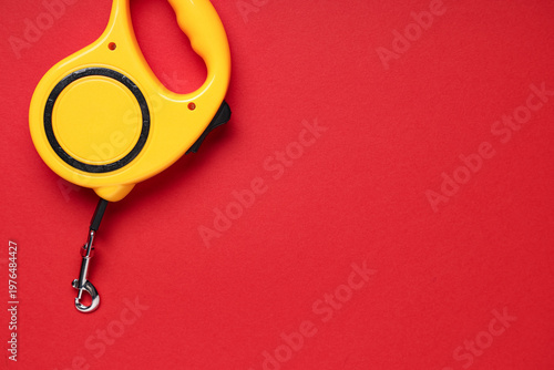 Yellow retractable dog leas...