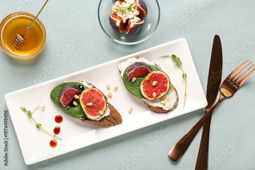 Plate of sandwiches with fr...
