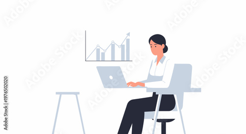 Businesswoman working diligently on laptop at desk with charts.