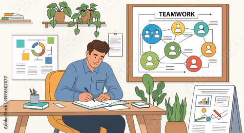 Man diligently working at his desk in an office setting.