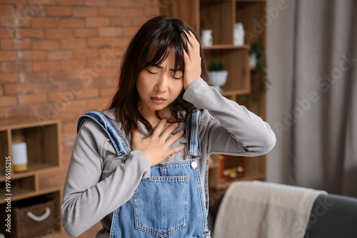 Young Asian woman with suic...