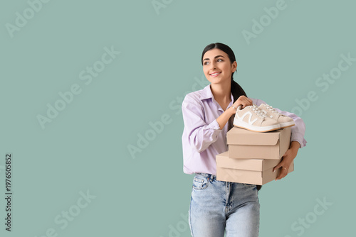 Young woman with sneakers a...