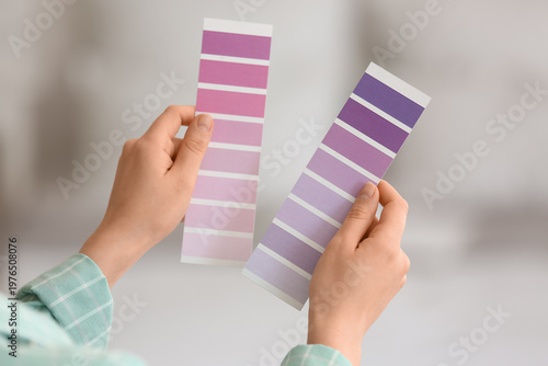 Female hands with violet pa...