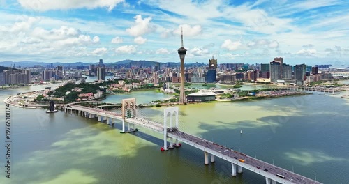 Aerial view of Macau Tower and Sai Van Bridge against the city skyline, Macau, China