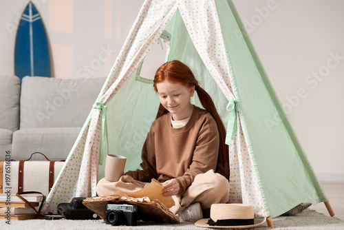 Cute teenage happy redhead ...