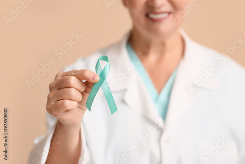Mature female doctor with t...