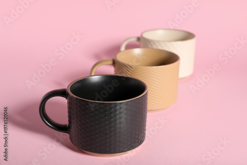 Different ceramic cups on p...