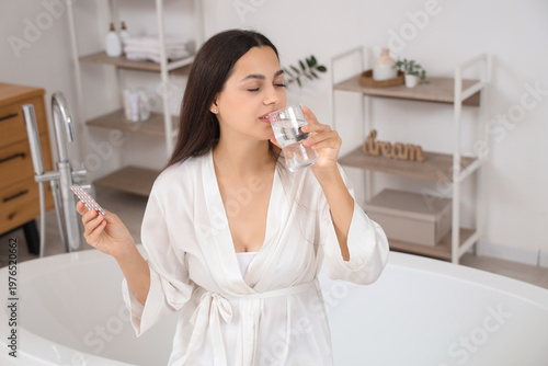 Young woman with oral contr...