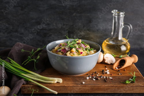 Bowl of tasty potato salad ...