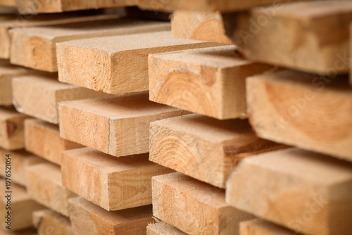 Slika na platnu Wooden boards at sawmill, closeup