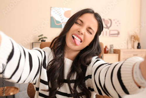 Pretty young woman taking s...