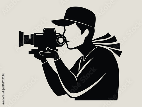 A photographer capturing moments with a vintage film camera and a cap.