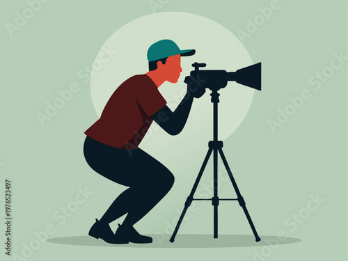 A photographer carefully adjusting a large camera on a tripod for a perfect shot