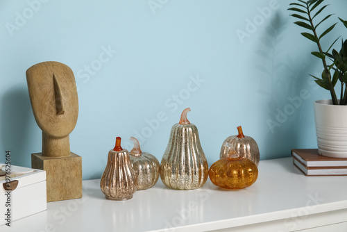 Decorative pumpkins with st...