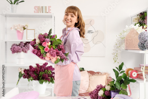 Female florist with beautif...