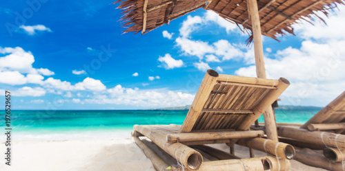 sun loungers on a sandy beach